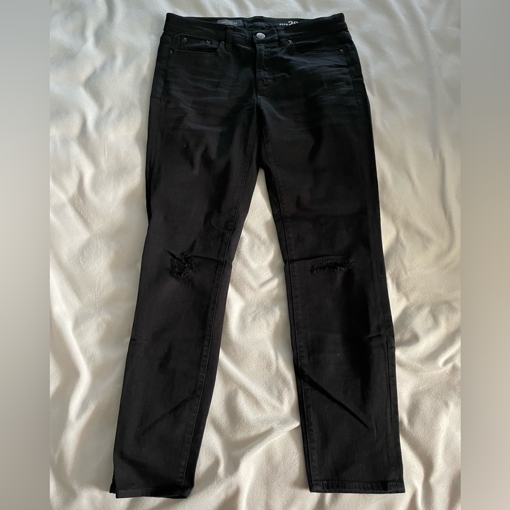 J. Crew ripped toothpick black jeans.